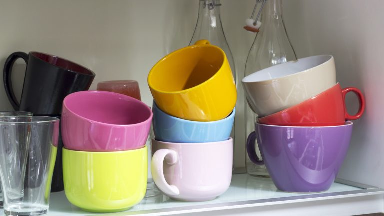 Maximize Kitchen Cabinet Storage by Organizing Coffee Mugs with Dollar Tree Products