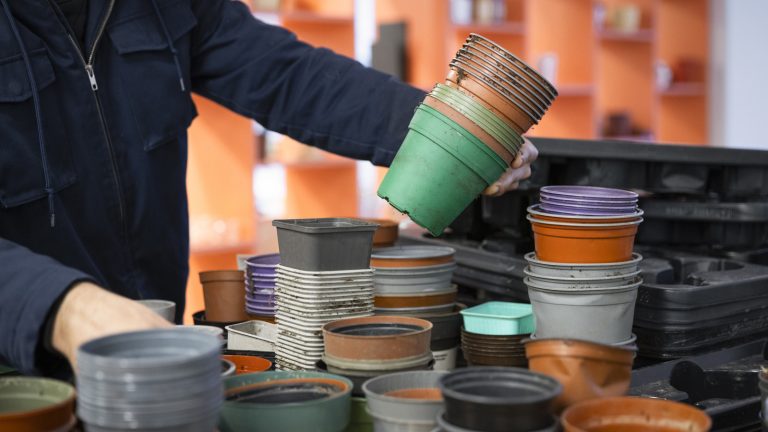 Start a Vertical Garden Using Reused Plastic Nursery Pots