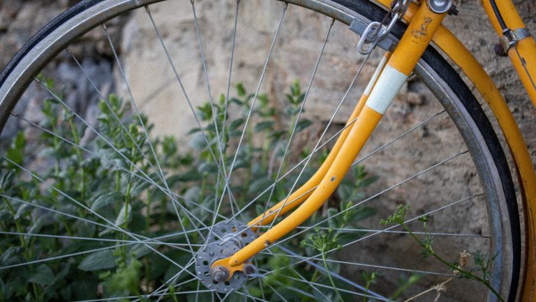 Transform an old bicycle wheel into a chic chandelier